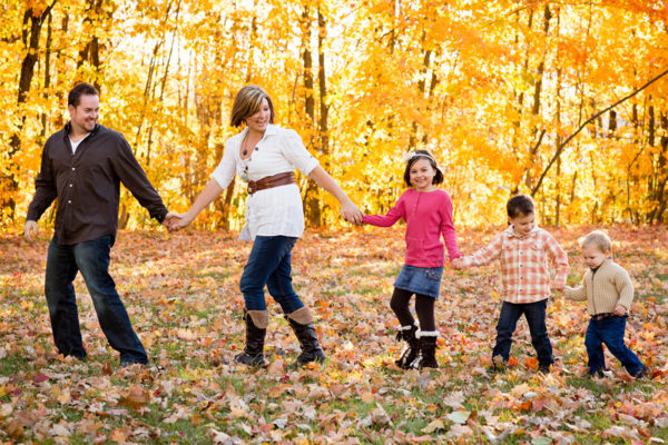 life_insurance family picture in woods